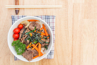 High angle view of salad in bowl on table