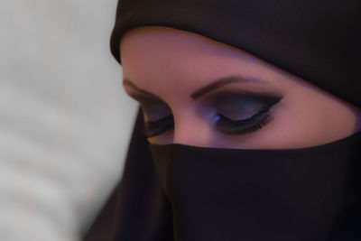 Close-up of woman with smokey eyeshadow in hijab