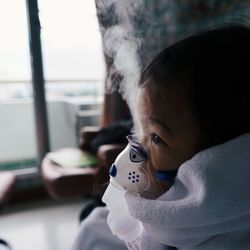 Close-up of child wearing mask