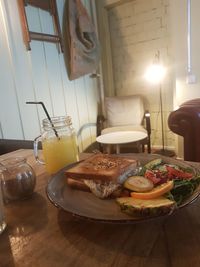 High angle view of breakfast served on table at home