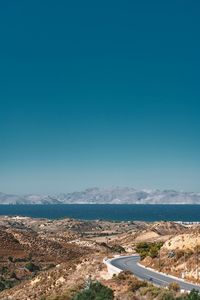 High angle view of landscape against clear blue sky