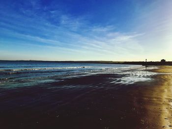 View of beach against sky during sunset