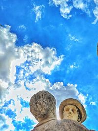 Low angle view of statue against sky