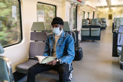 Man sitting in train