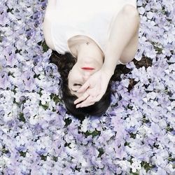 Close-up of woman holding flowers