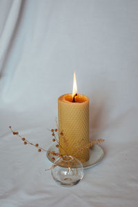 Close-up of illuminated candle