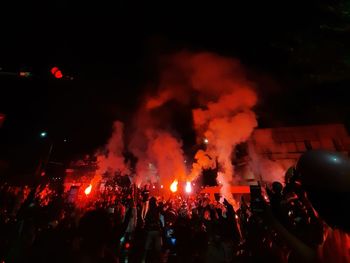 Crowd at music concert at night