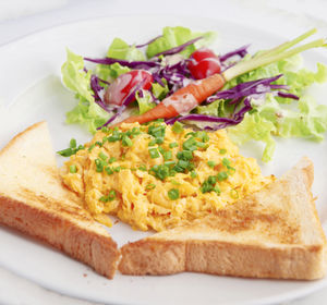 Close-up of breakfast served in plate