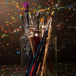 Close-up of glass jar on table