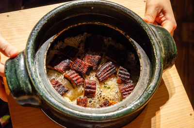 Midsection of person holding food