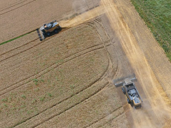 Tractors working on agricultural field