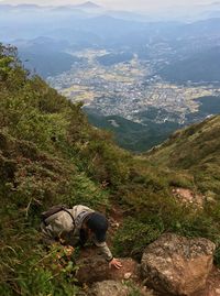Man looking at mountain