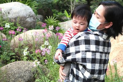 Father and son on flower