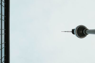 Close-up of clock tower against sky