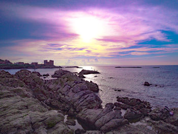 Scenic view of sea against sky during sunset