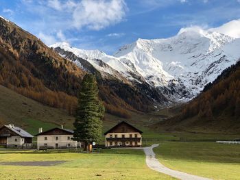 Scenic view of snowcapped mountains against sky