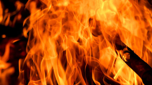 Close-up of fire burning at night