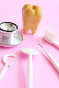Close-up of dental equipment on table