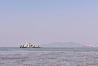 Scenic view of sea against clear sky