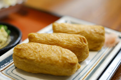 Close-up of food served in tray