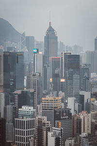 Modern buildings in city against sky