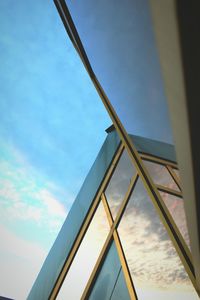 Low angle view of building against blue sky