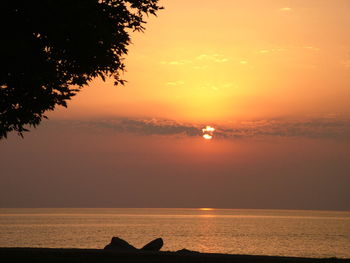 Scenic view of sunset over sea