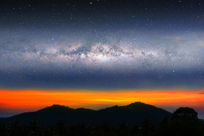 Low angle view of star field against sky at night