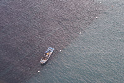 High angle view of boat sailing on sea