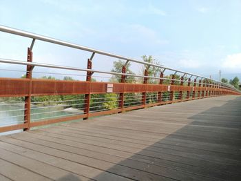 View of bridge against cloudy sky