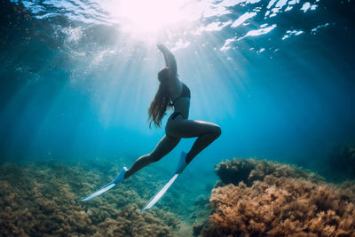 Man swimming in sea