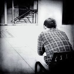 Full length of woman standing on bench