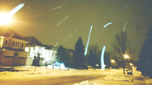 Illuminated street lights at night