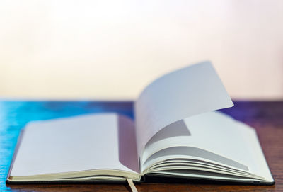 Close-up of open book on table