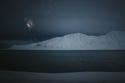 High angle view of illuminated street at night