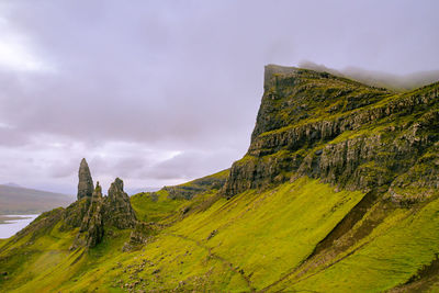 Rock formations on mountain against sky