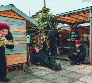 People sitting outside building