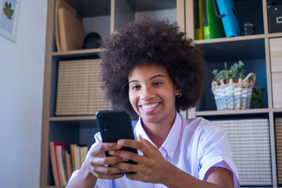 Young woman using mobile phone