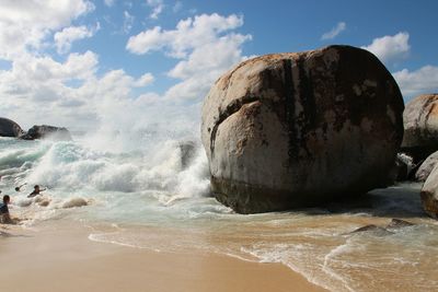 Panoramic shot of sea shore against sky