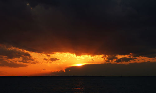 Scenic view of sunset over sea