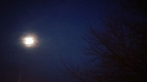 Low angle view of moon in sky