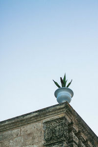 High section of built structure against clear sky