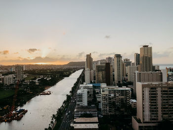 High angle view of buildings against sky during sunset