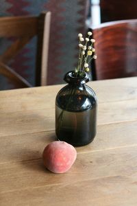 Peach and vase