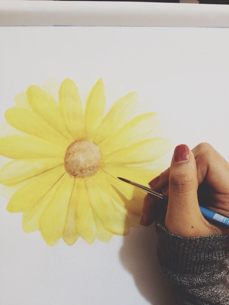 yellow, flower, indoors, close-up, petal, freshness, flower head, fragility, one person, cropped, part of, copy space, white background, studio shot, high angle view, table, single flower, pollen, home interior