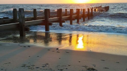 Scenic view of sea at sunset