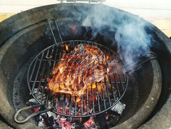 Close-up of meat on grill