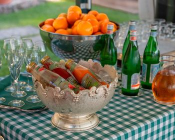 Close-up of fruits in glass bowl on table