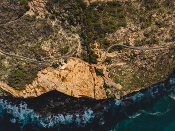 High angle view of rock formation in water