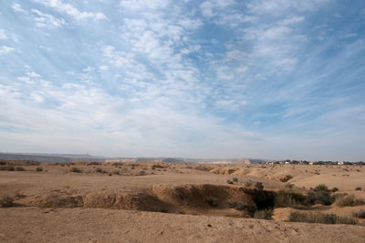 Scenic view of desert against sky